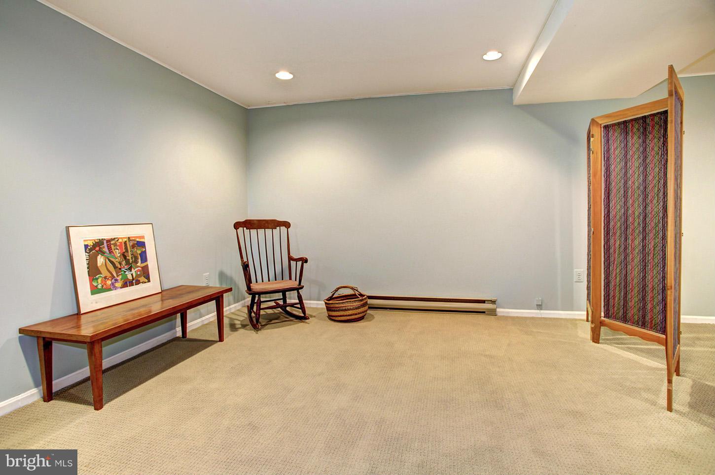 22316 West Harris Road Barnesville, MD 20838 - Photo 24 of 30 an empty room with furniture and a ceiling fan