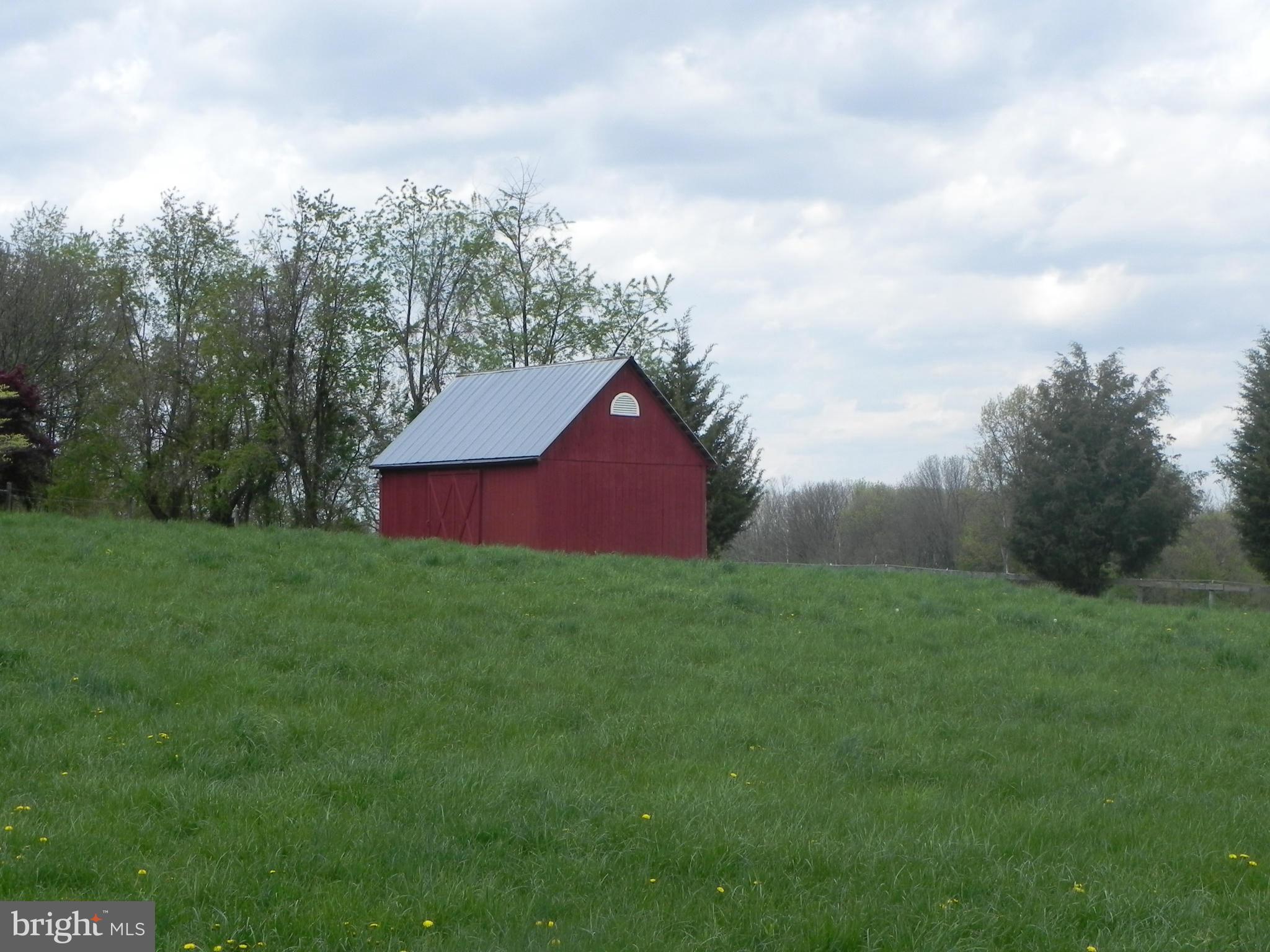 22316 West Harris Road Barnesville, MD 20838 - Photo 29 of 30 a view of backyard with green space and wooden fence