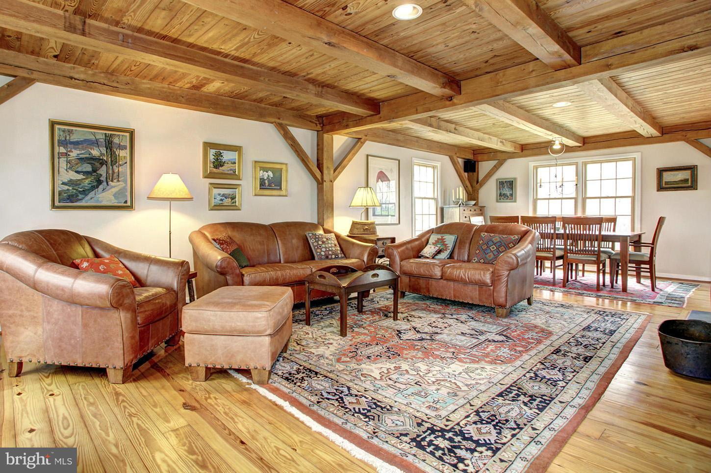 22316 West Harris Road Barnesville, MD 20838 - Photo 5 of 30 a living room with lots of furniture and a rug