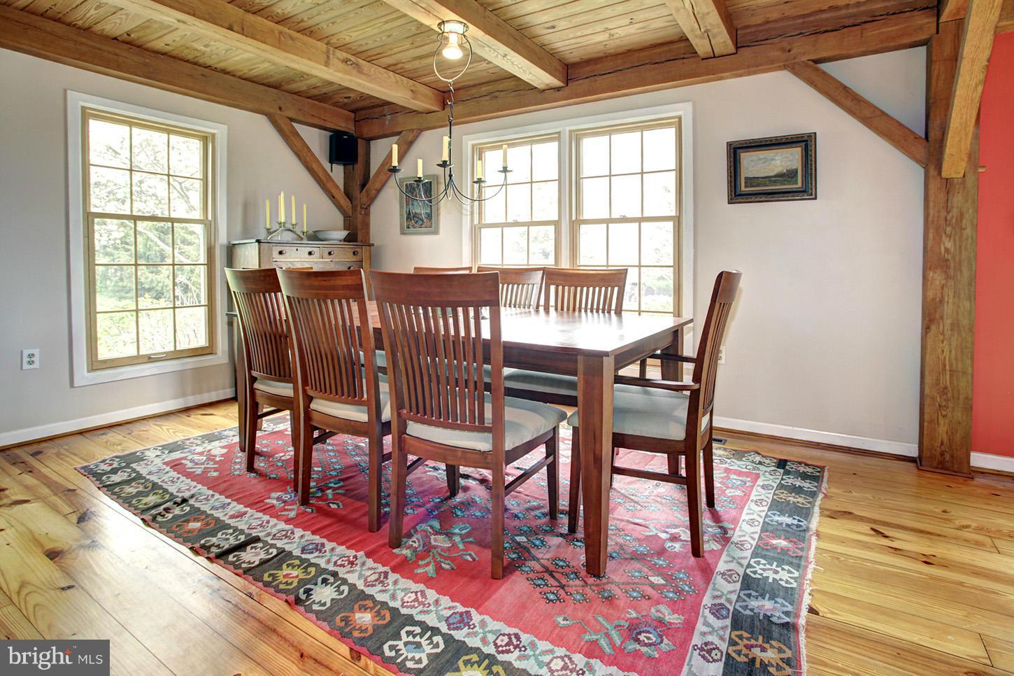 22316 West Harris Road Barnesville, MD 20838 - Photo 7 of 30 a view of a dining room with furniture window and wooden floor
