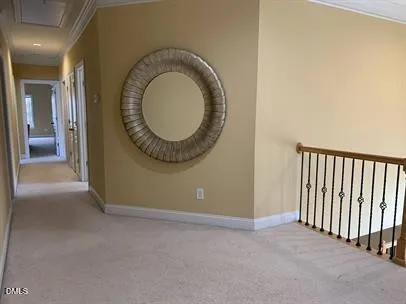 a view of a livingroom with washer and dryer