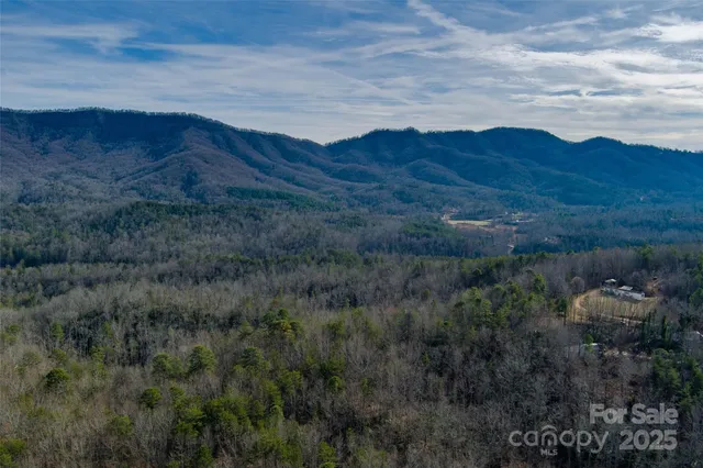 a view of mountains and valleys