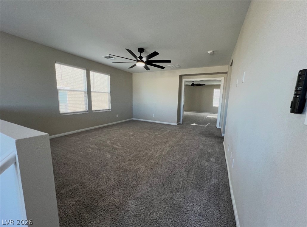 6905 Diablo Rim Street North Las Vegas, NV 89086 - Photo 23 of 39 This versatile bonus room offers ample space and comfort for various activities.
