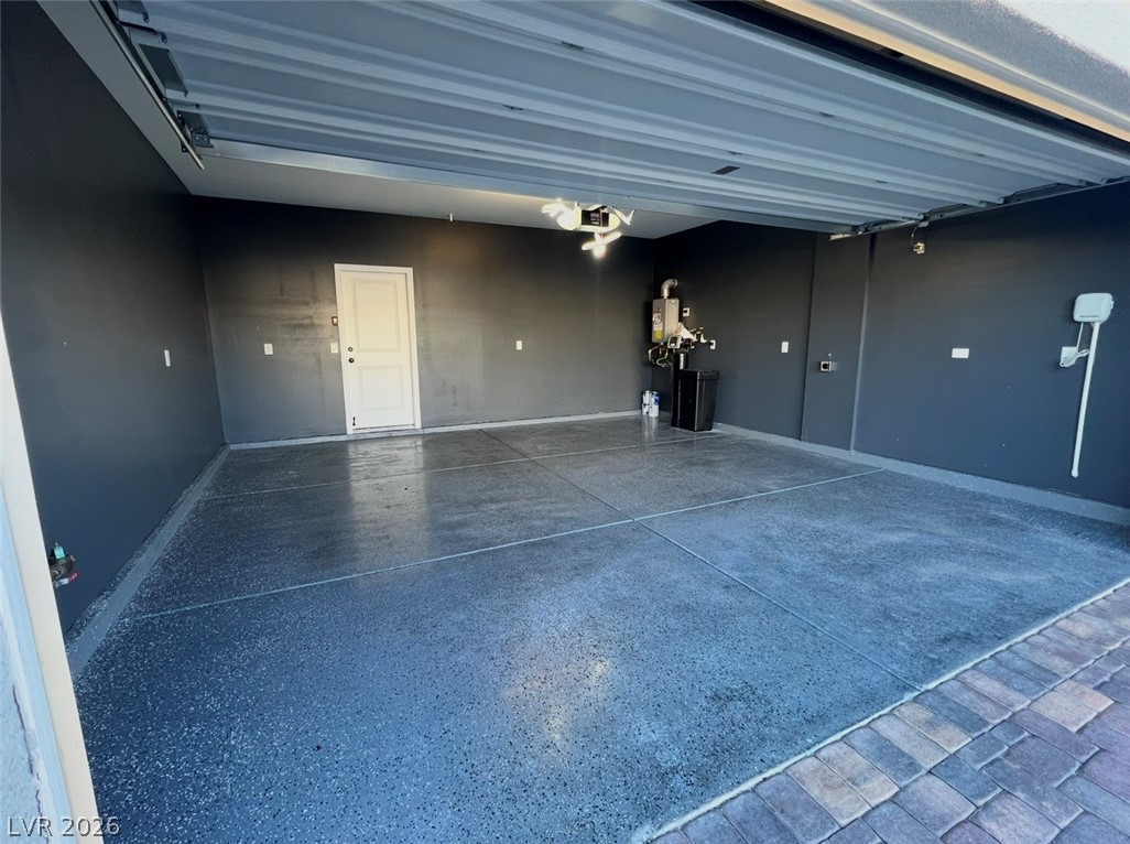 6905 Diablo Rim Street North Las Vegas, NV 89086 - Photo 33 of 39 This spacious garage features a durable epoxy floor and convenient interior access.