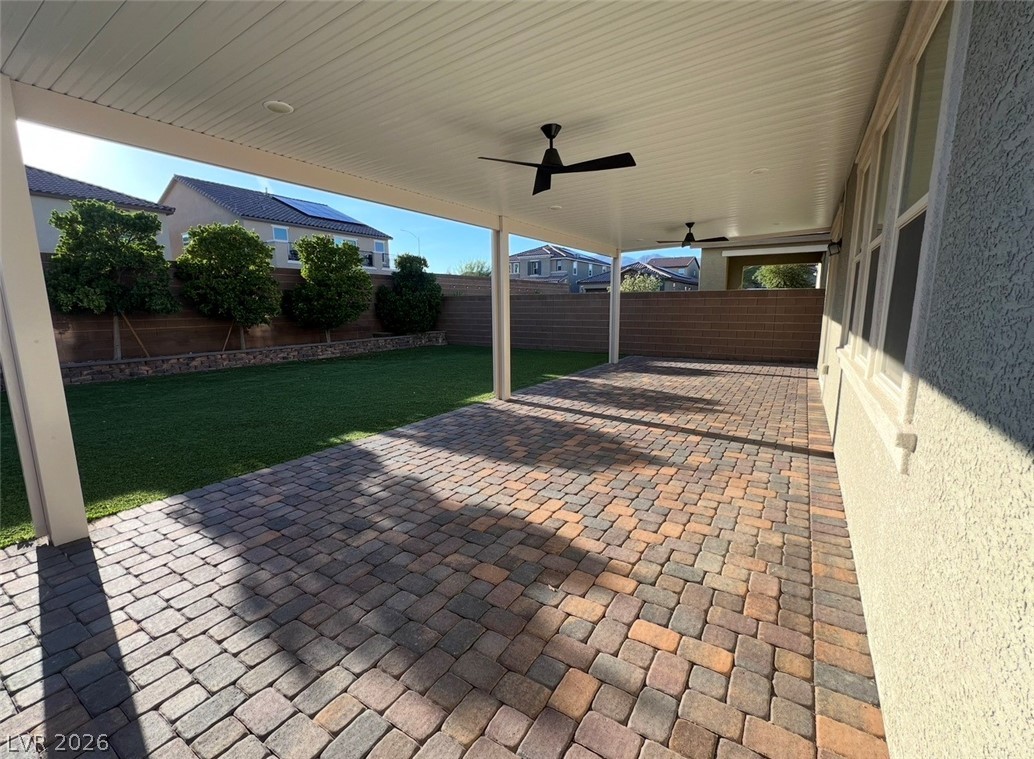6905 Diablo Rim Street North Las Vegas, NV 89086 - Photo 38 of 39 This outdoor patio features a paver stone surface and covered area, ideal for relaxation.