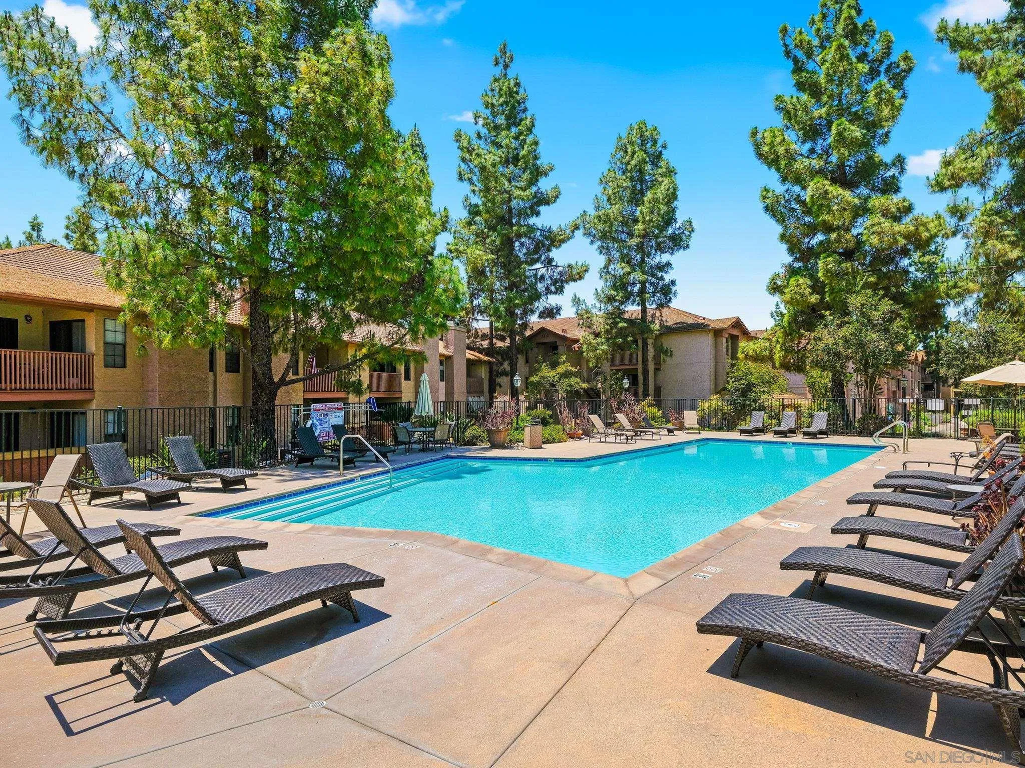 12023 Alta Carmel Court, Unit 244 San Diego, CA 92128 - Photo 16 of 16 a view of a patio with chairs and plants