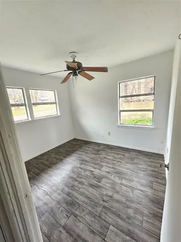 a view of empty room with windows