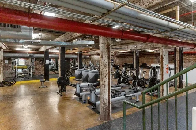 a view of a building with potted plants