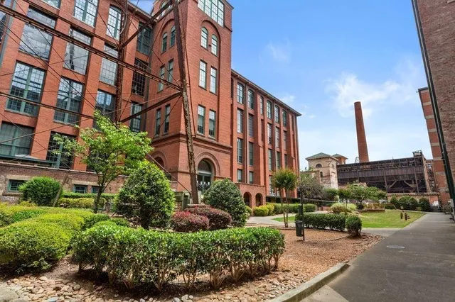 a front view of a building with street view