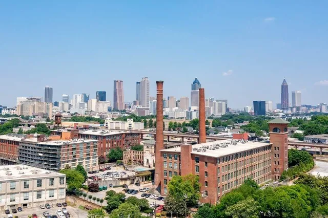 a view of a city and lake