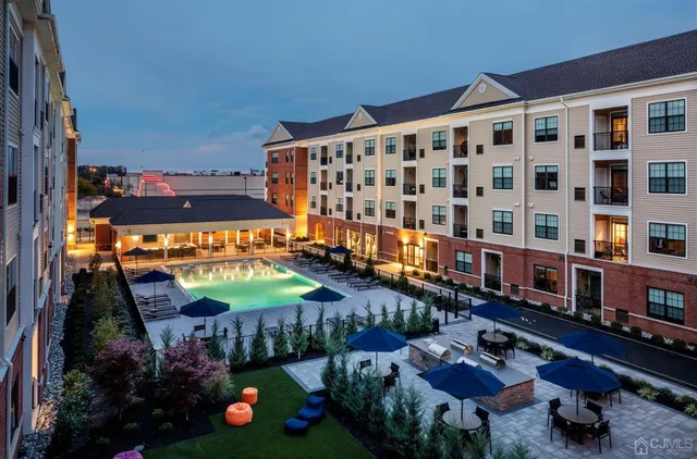 an aerial view of a house roof deck and outdoor space