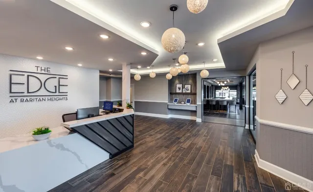 a kitchen with a table and chairs