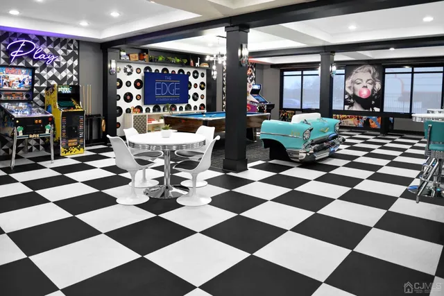 a kitchen with a sink a stove and a microwave