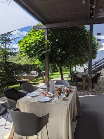 a backyard of a house with seating space