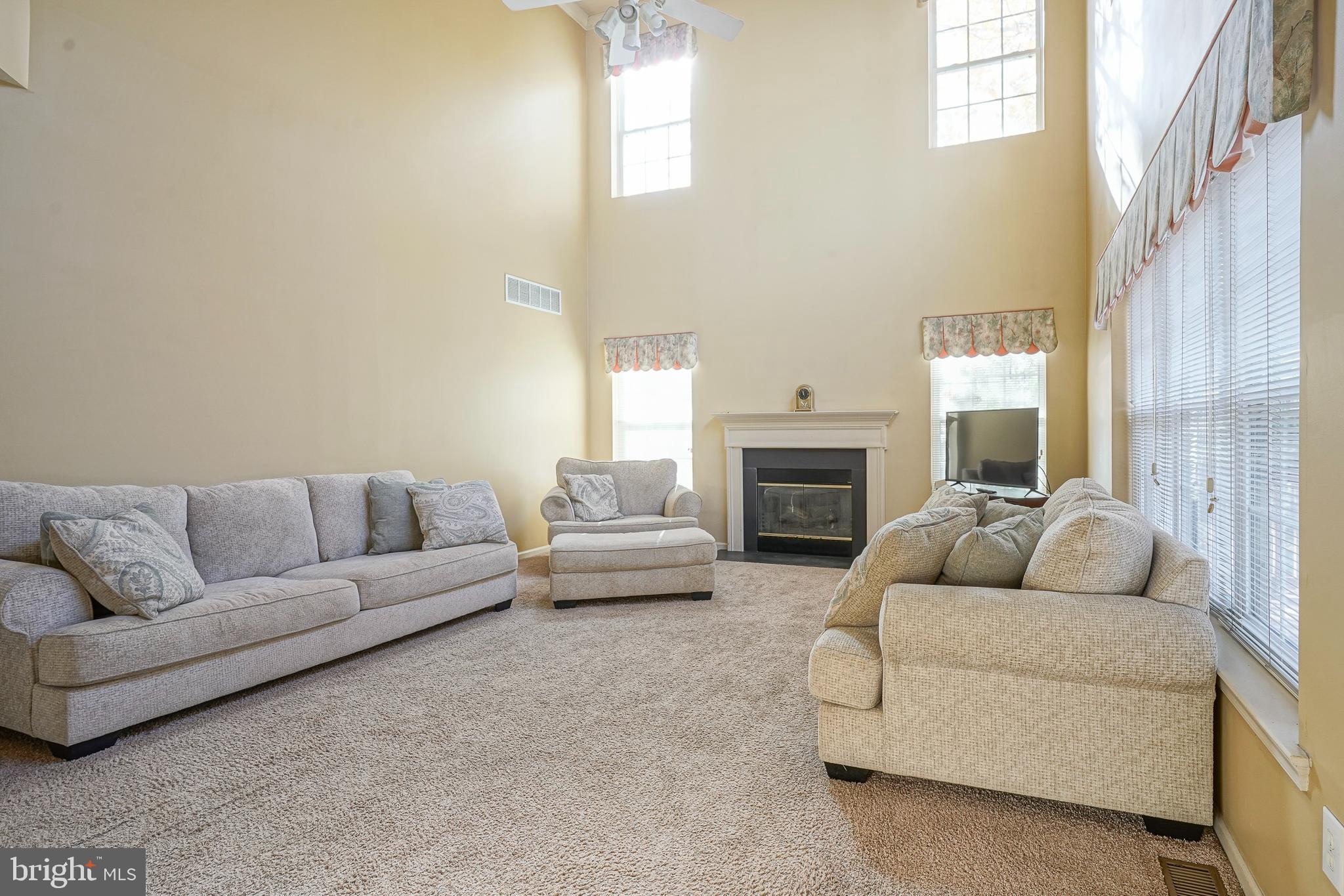 6 Sylvan Court Delran, NJ 08075 - Photo 11 of 49 a living room with furniture and a fireplace