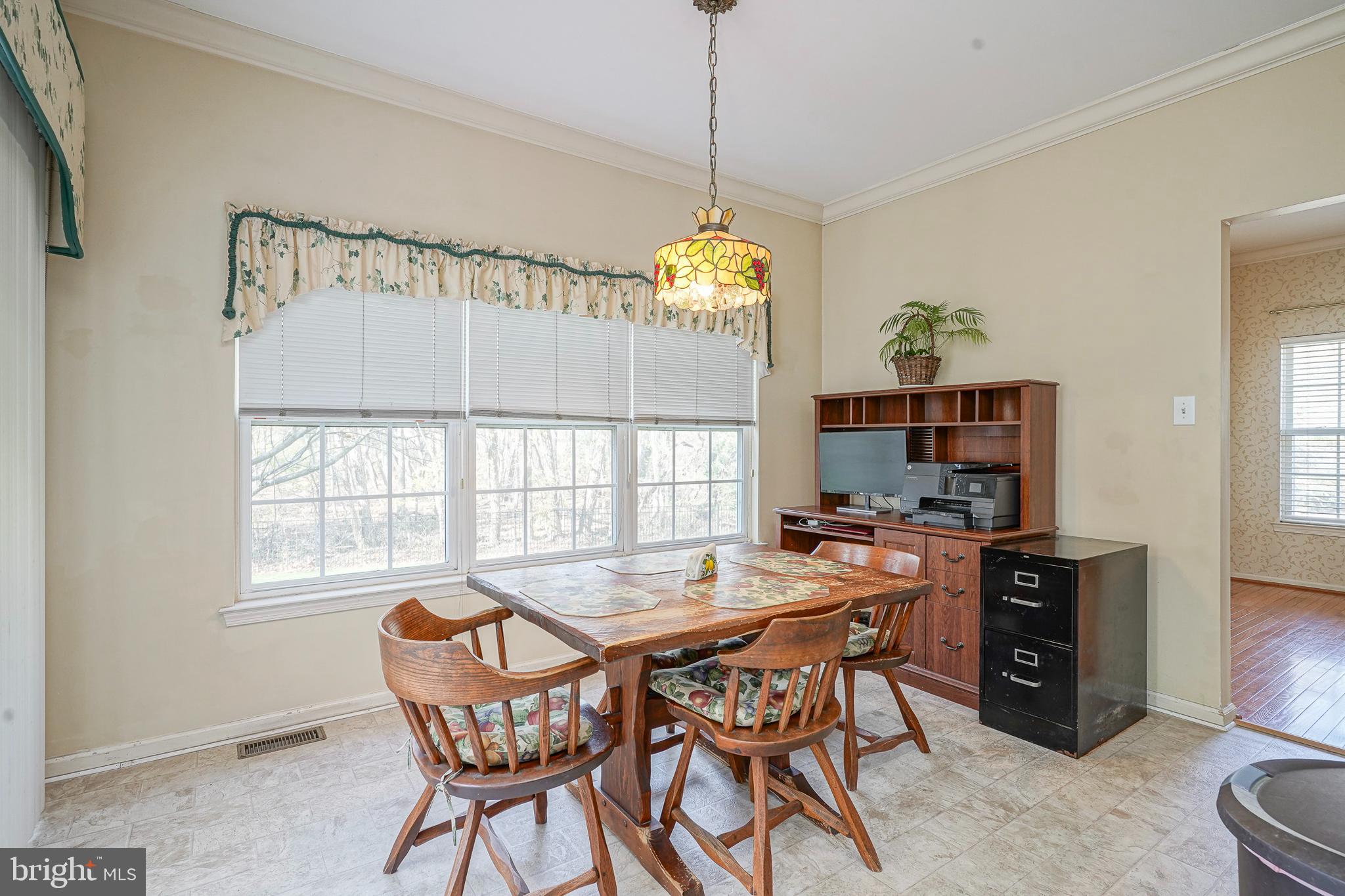 6 Sylvan Court Delran, NJ 08075 - Photo 17 of 49 a view of a dining room with furniture window and outside view