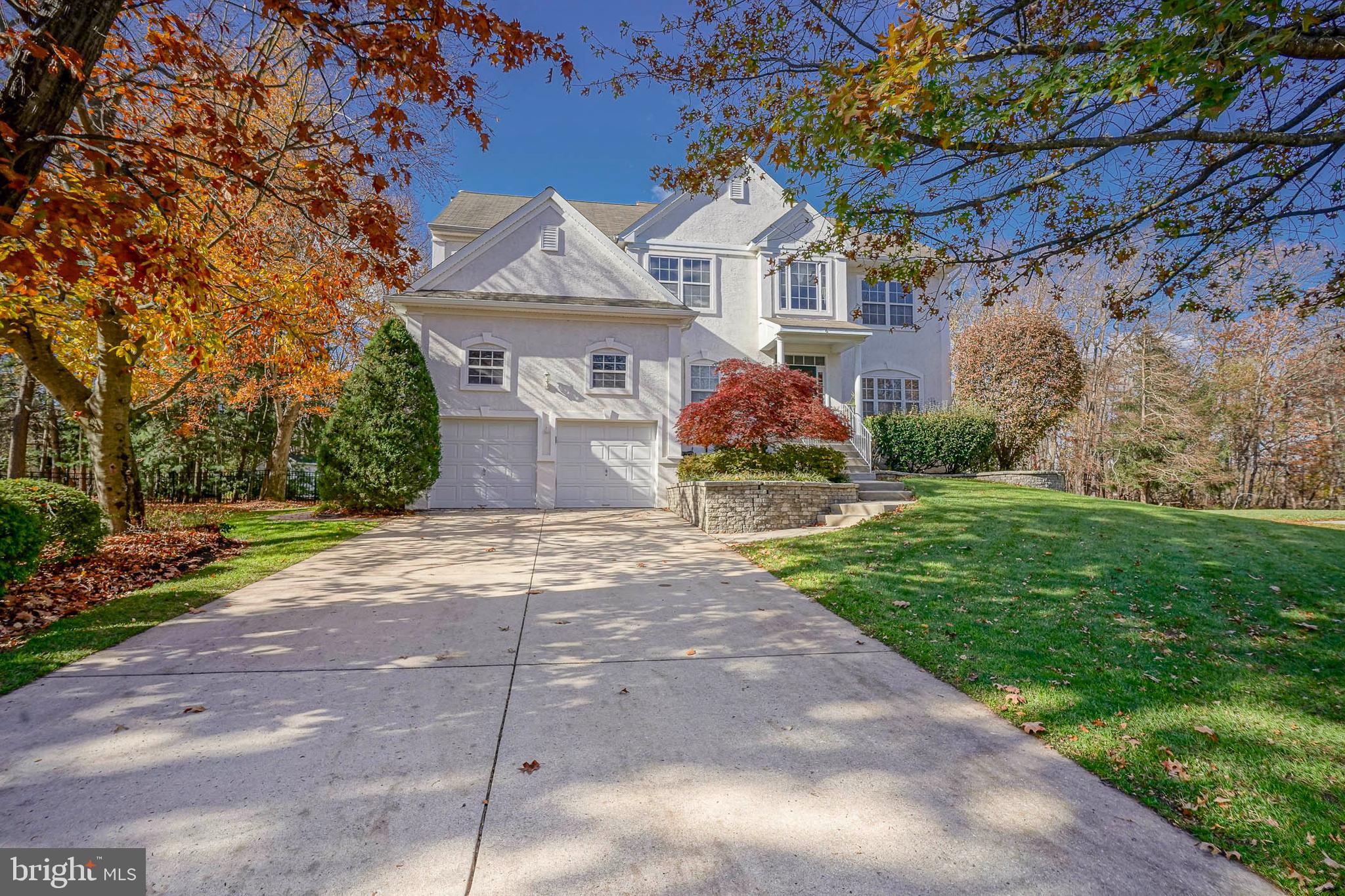 6 Sylvan Court Delran, NJ 08075 - Photo 3 of 49 a front view of a house with a yard and garage