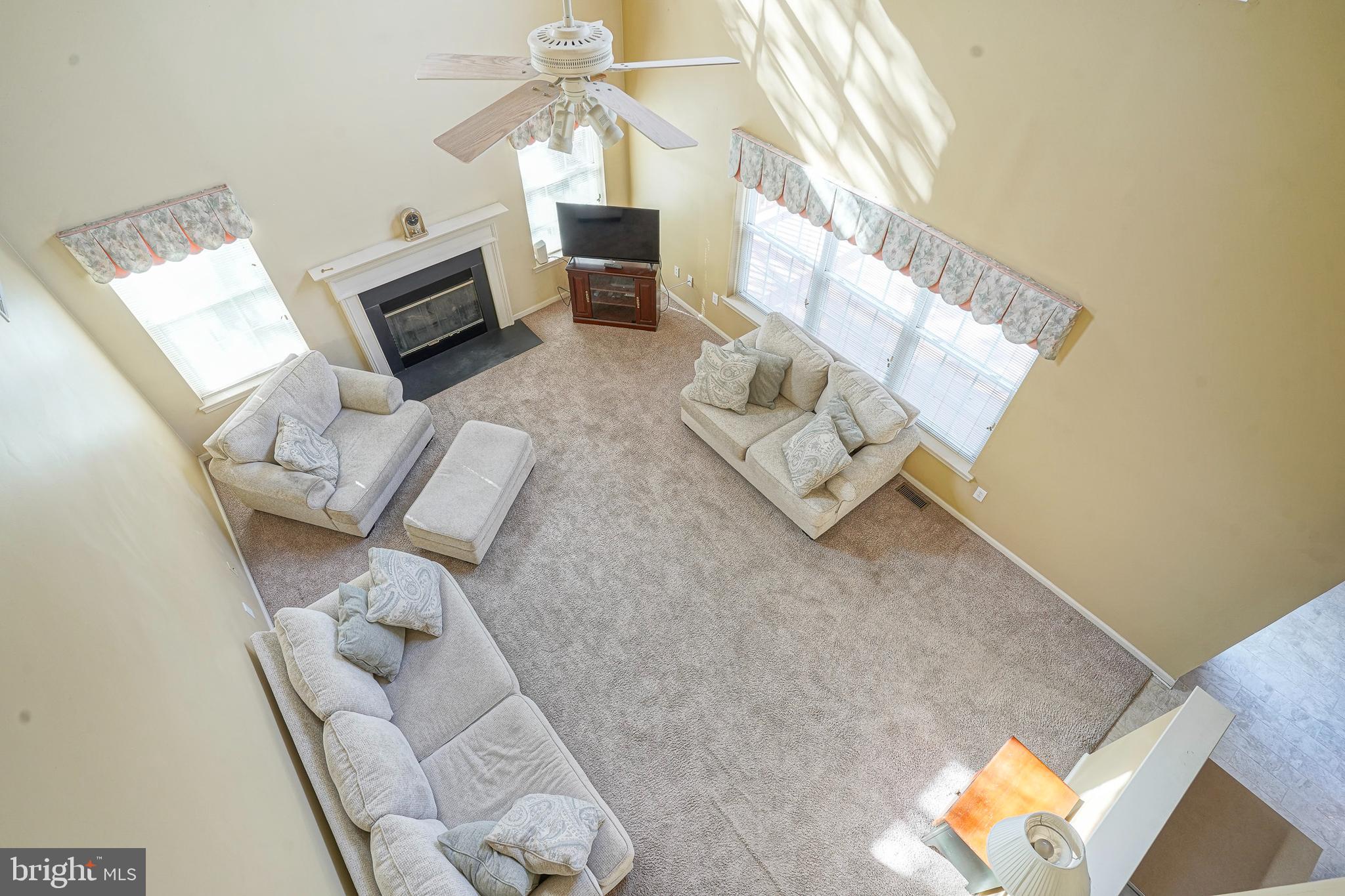 6 Sylvan Court Delran, NJ 08075 - Photo 38 of 49 a living room with furniture and a flat screen tv