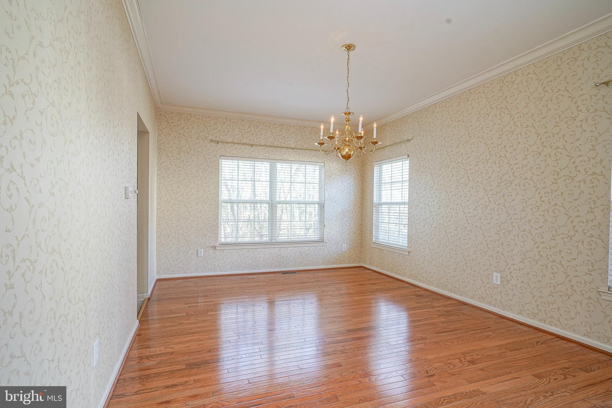 6 Sylvan Court Delran, NJ 08075 - Photo 9 of 49 wooden floor in an empty room with a window