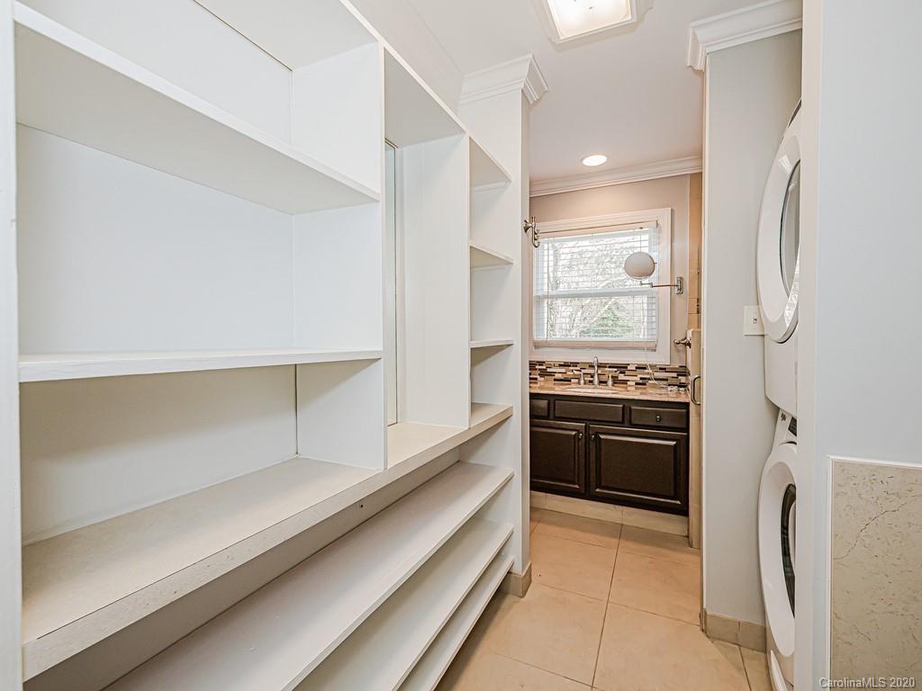 5706 Telfair Road Charlotte, NC 28210 - Photo 23 of 37 a kitchen with stainless steel appliances a refrigerator and a stove
