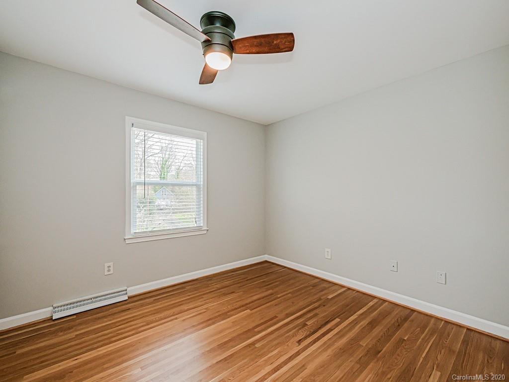 5706 Telfair Road Charlotte, NC 28210 - Photo 28 of 37 an empty room with a window