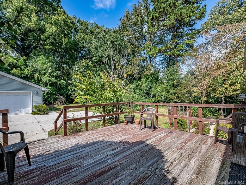 5706 Telfair Road Charlotte, NC 28210 - Photo 31 of 37 a view of house with deck and seating space
