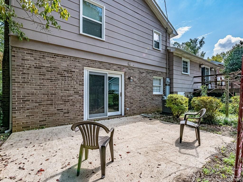 5706 Telfair Road Charlotte, NC 28210 - Photo 32 of 37 a backyard of a house with seating space
