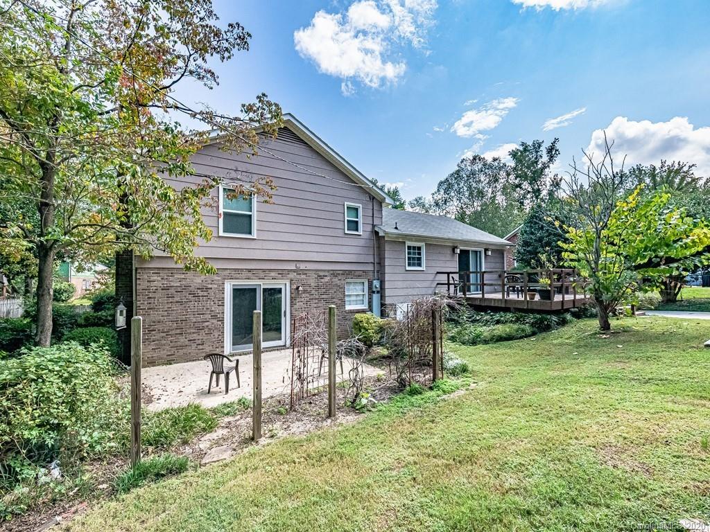 5706 Telfair Road Charlotte, NC 28210 - Photo 35 of 37 a view of a house with a backyard