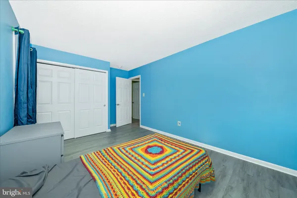 a view of a big room with an entryway