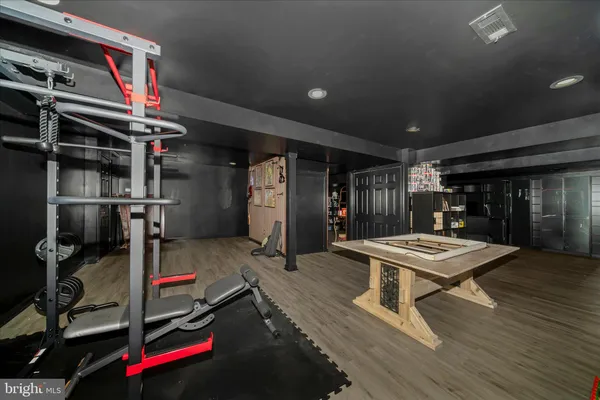 a outdoor living space with furniture and a baby crib