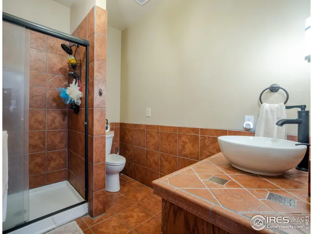 a bathroom with a sink and toilet