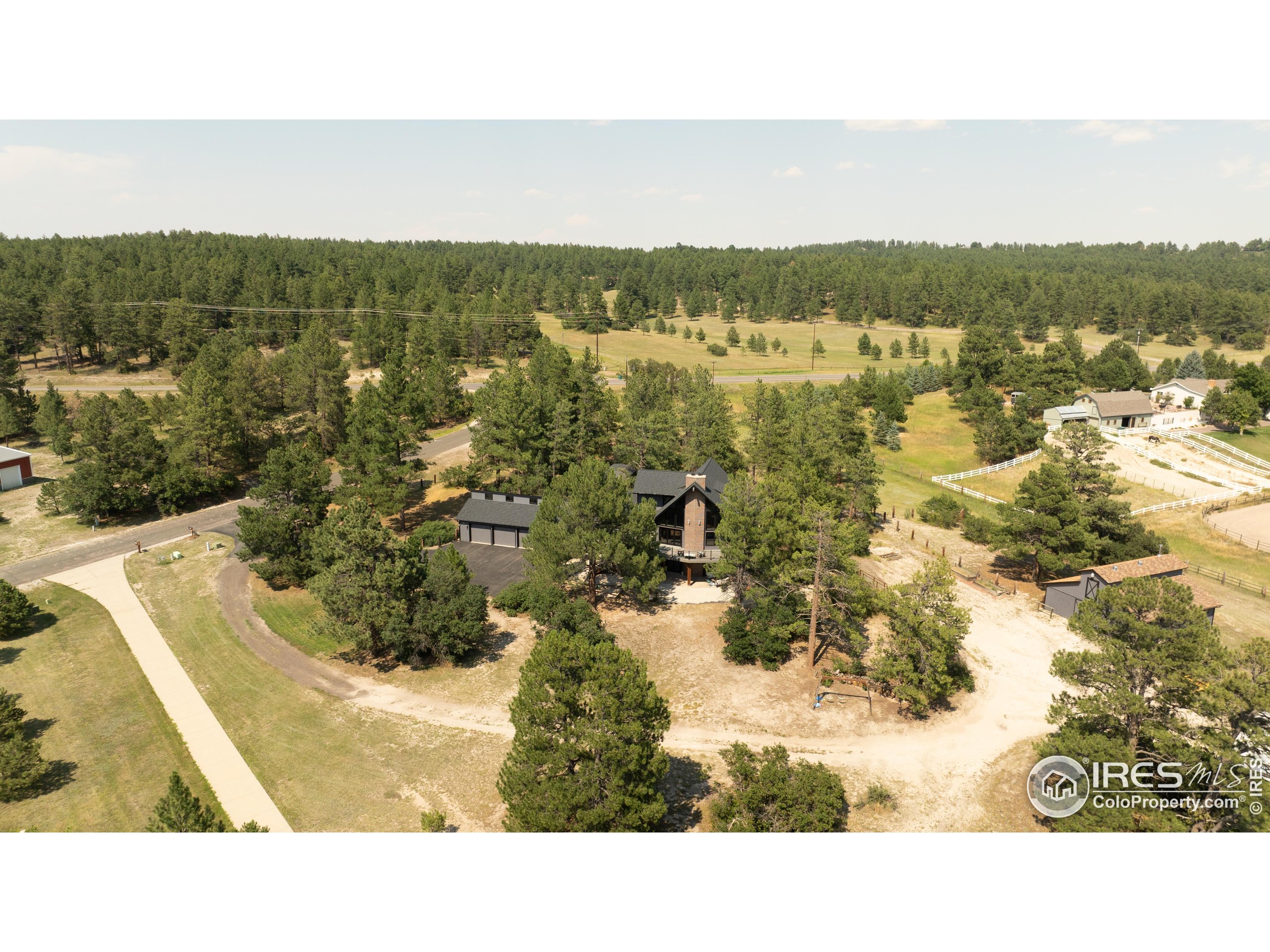 8987 Village Pines Circle Franktown, CO 80116 - Photo 24 of 31 a view of lake and mountain