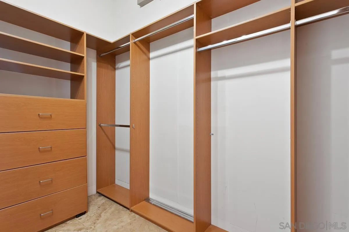 4103 Fallsbrae Road Fallbrook, CA 92028 - Photo 24 of 48 a view of walk in closet with empty racks