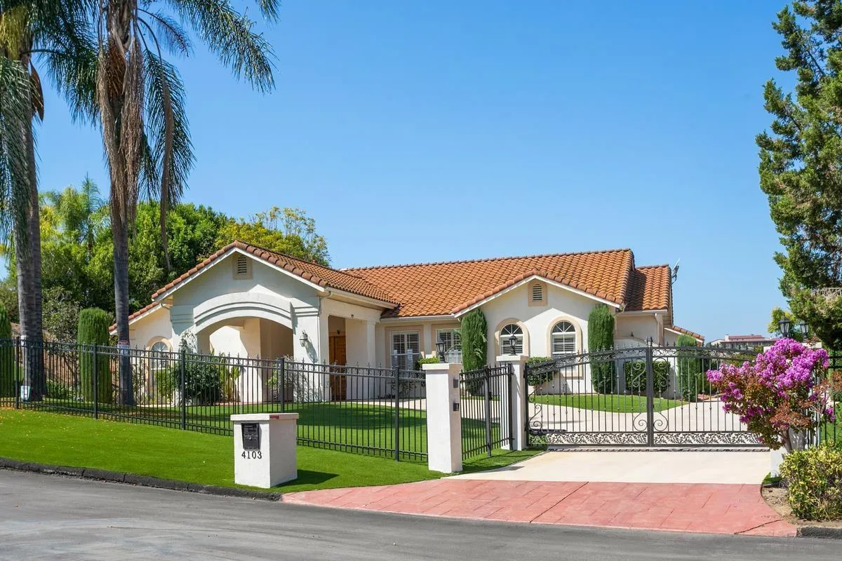 4103 Fallsbrae Road Fallbrook, CA 92028 - Photo 4 of 48 a front view of a house with a garden