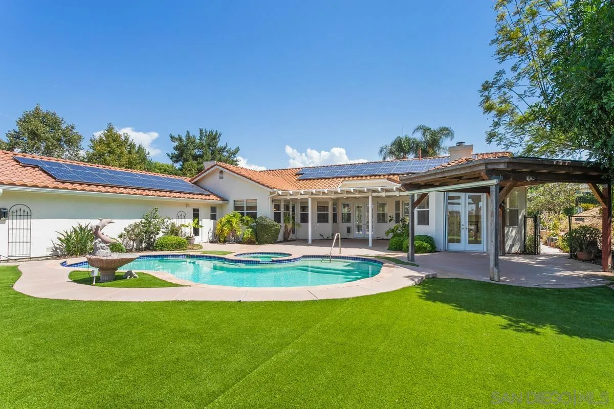 4103 Fallsbrae Road Fallbrook, CA 92028 - Photo 41 of 48 a patio with table and chairs