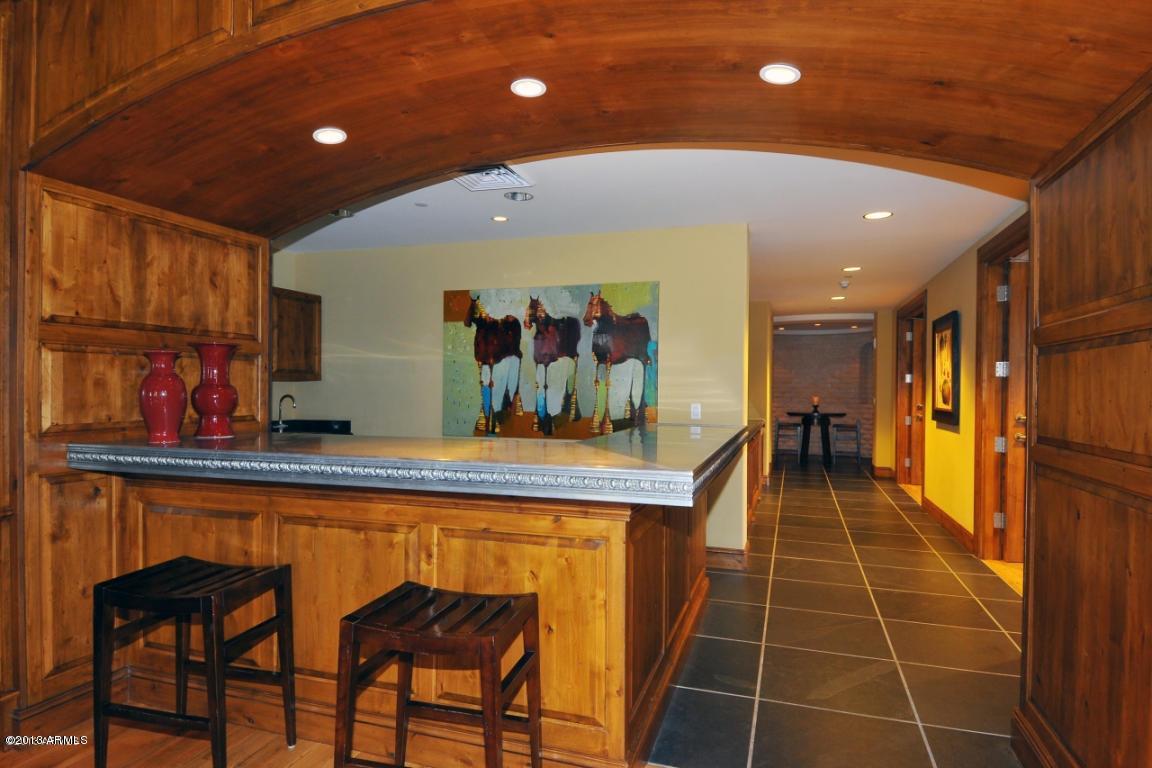 7181 East Camelback Road, Unit 304 Scottsdale, AZ 85251 - Photo 29 of 38 Club Room Bar
