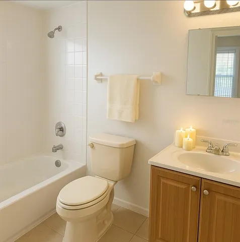 a view of an empty room and a window