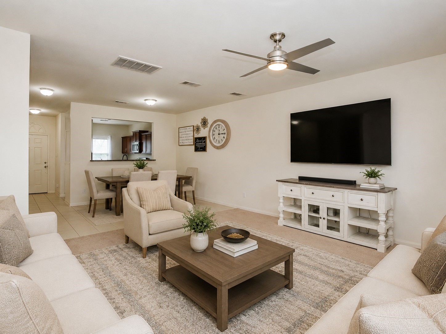 1322 Emerald Stone Drive Rosharon, TX 77583 - Photo 8 of 23 a living room with furniture and a flat screen tv
