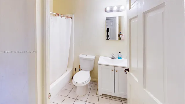 view of a brick building with many windows