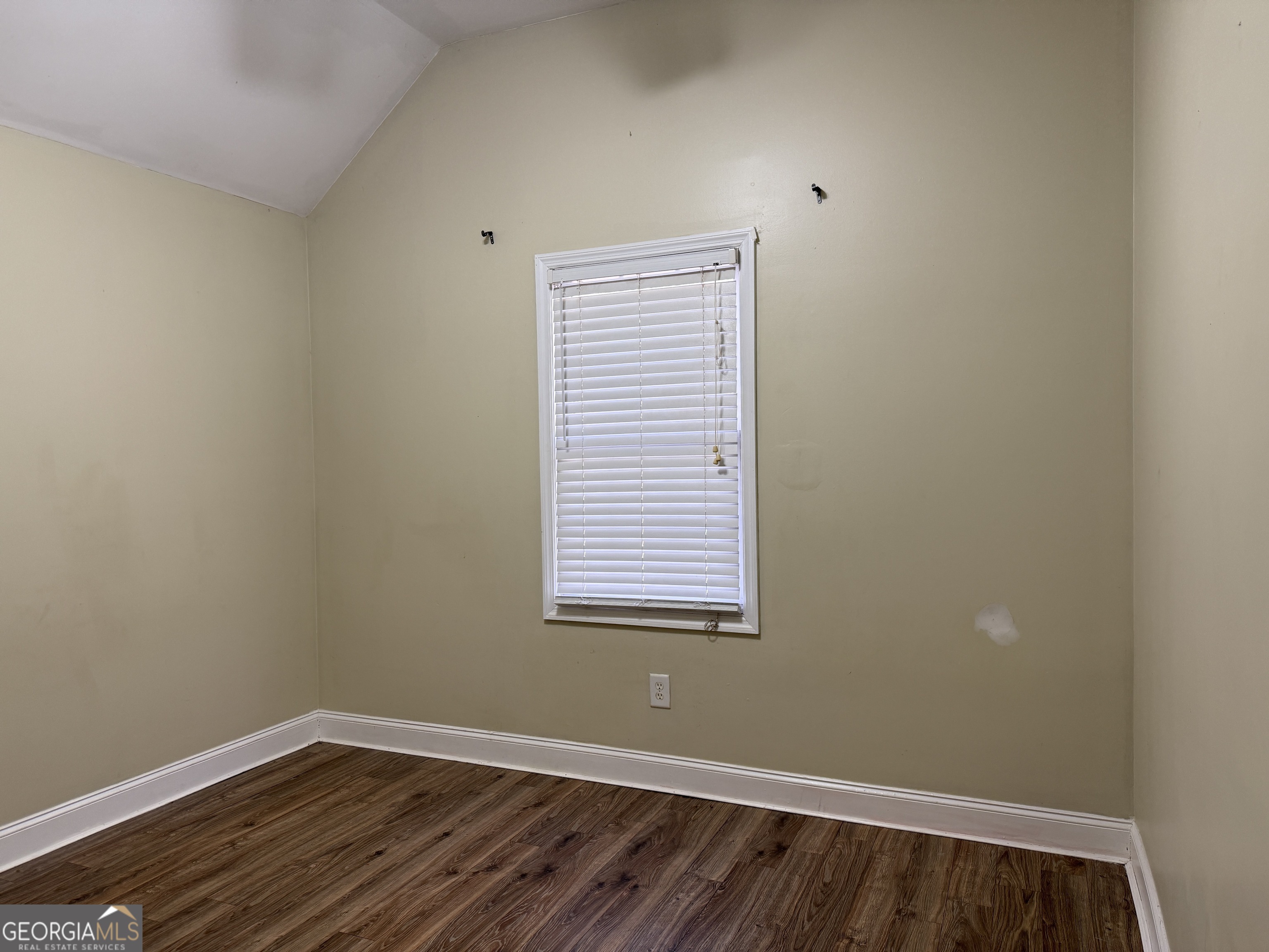 4770 Colham Ferry Road Watkinsville, GA 30677 - Photo 13 of 20 a view of a small space with wooden floor and a window