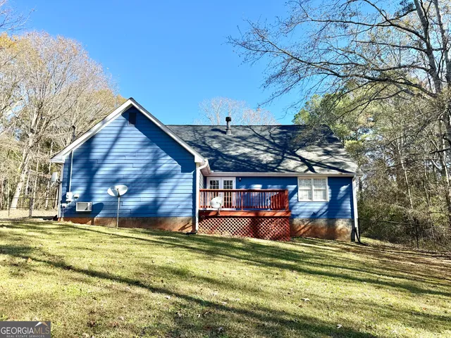 a view of house with trees