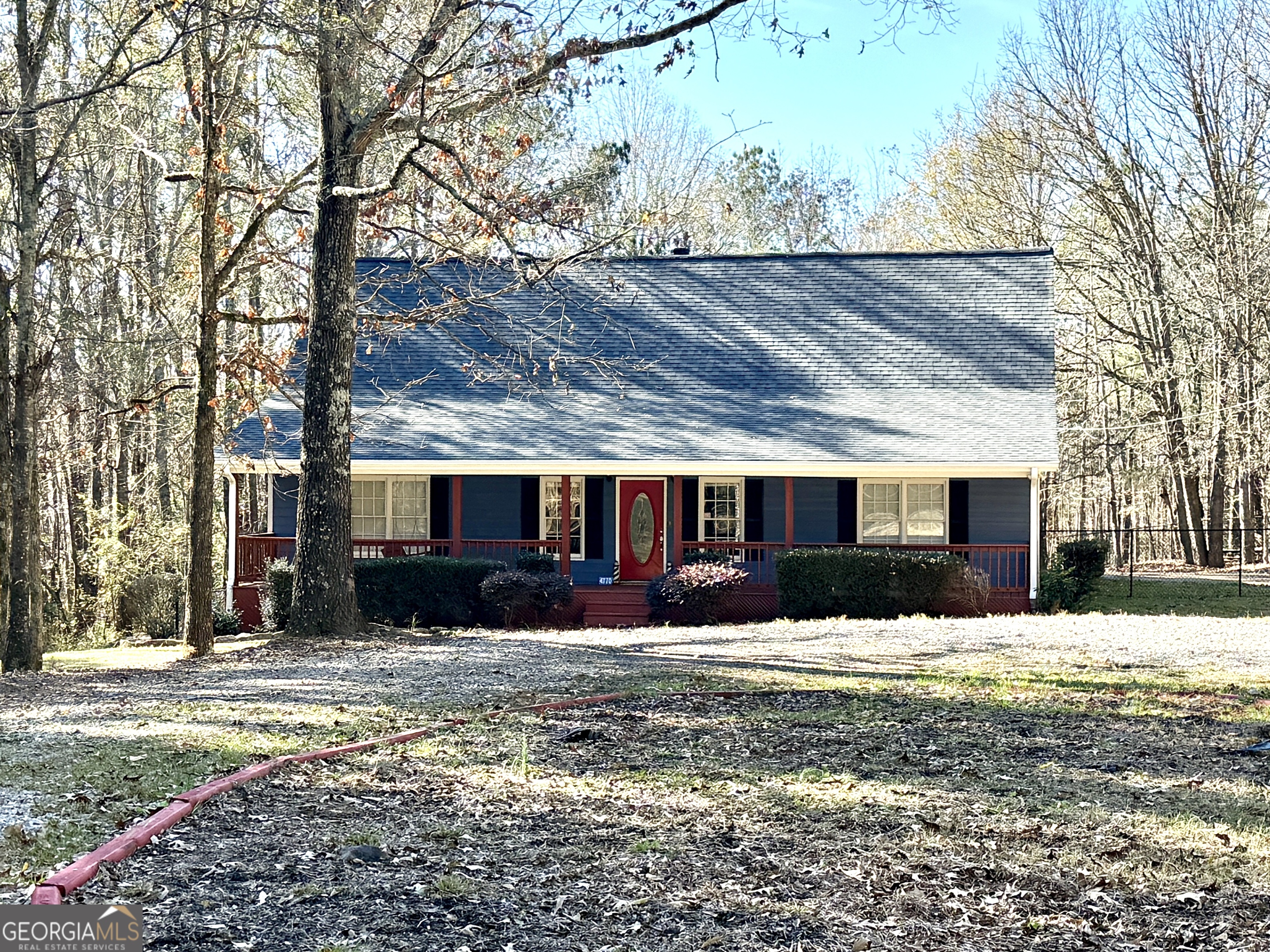 4770 Colham Ferry Road Watkinsville, GA 30677 - Photo 2 of 20 a view of a house with a yard covered in snow