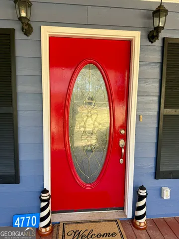 a view of a balcony with wooden floor