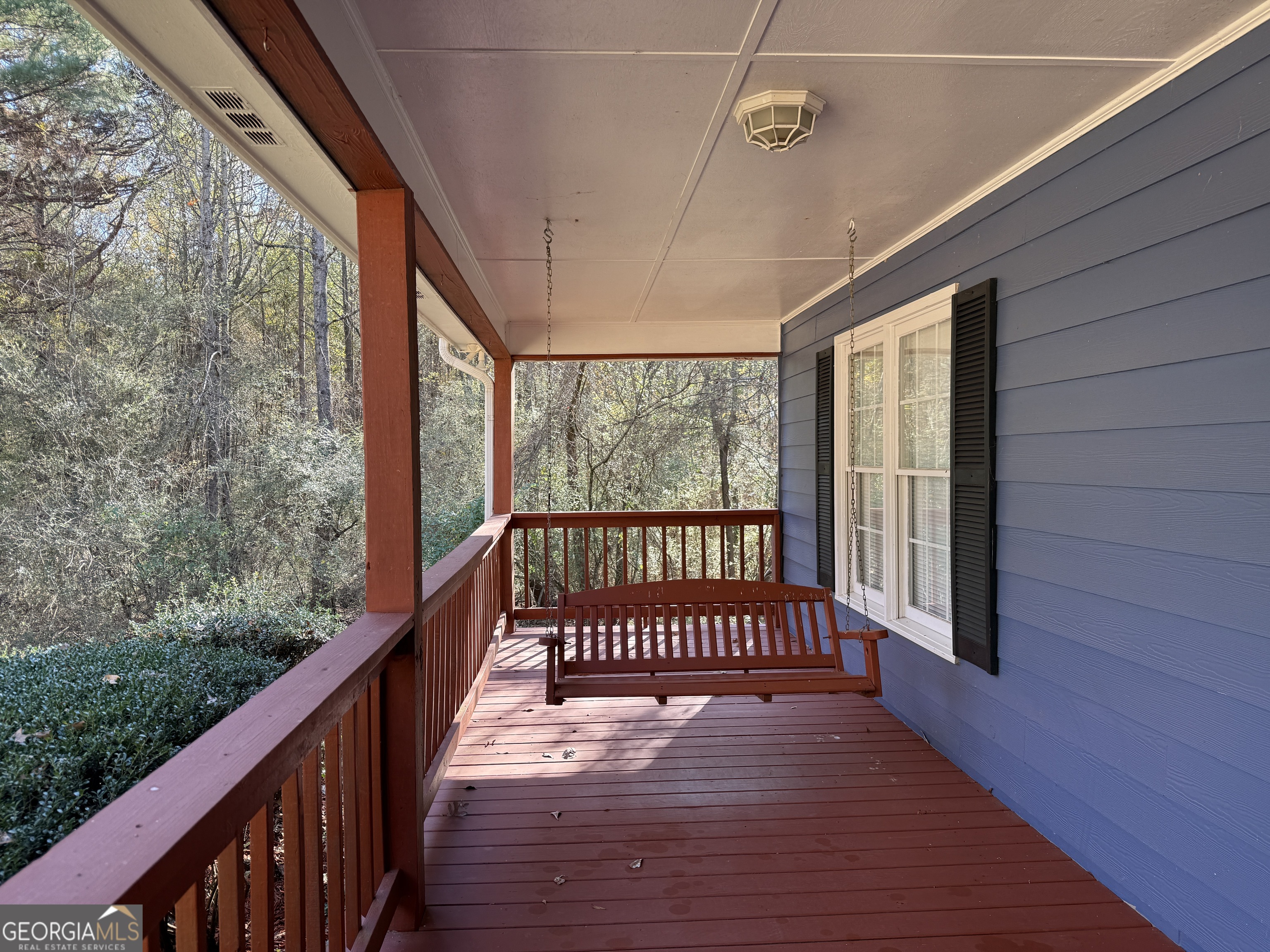 4770 Colham Ferry Road Watkinsville, GA 30677 - Photo 4 of 20 a view of a balcony with wooden floor