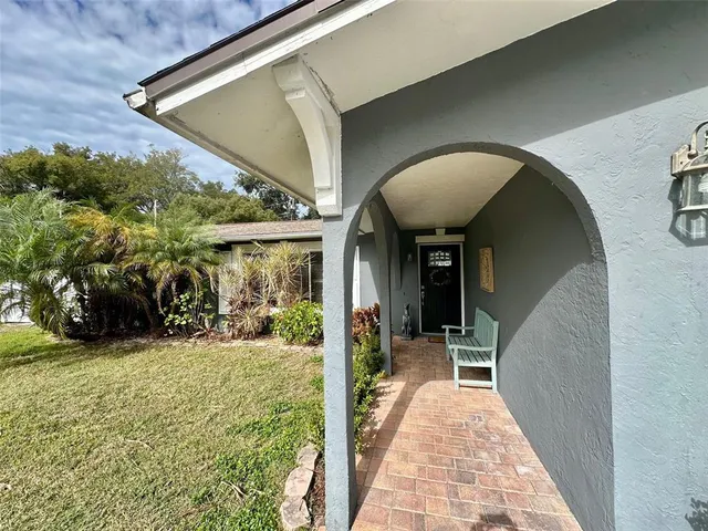 a view of a porch with furniture