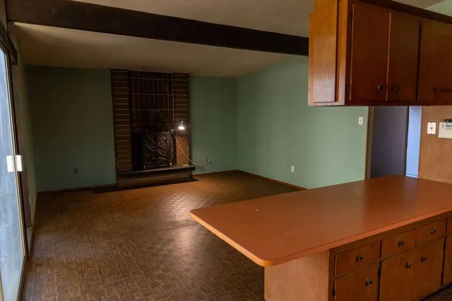 a view of an empty room with window