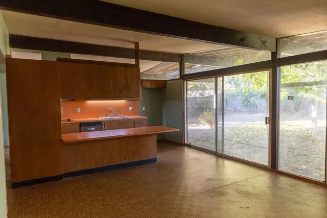 a room with furniture and a window