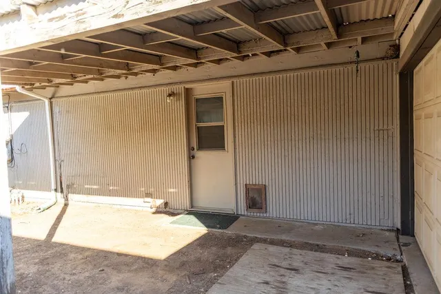 a view of a backyard of a house