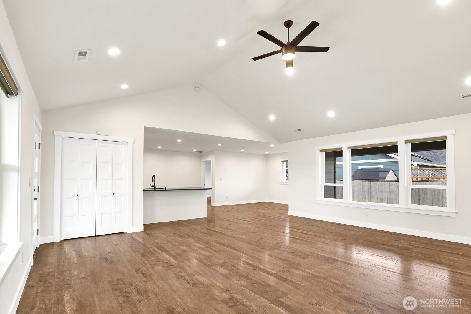 1302 Night Hawk Way Everson, WA 98247 - Photo 11 of 35 a view of an empty room with a ceiling fan and window