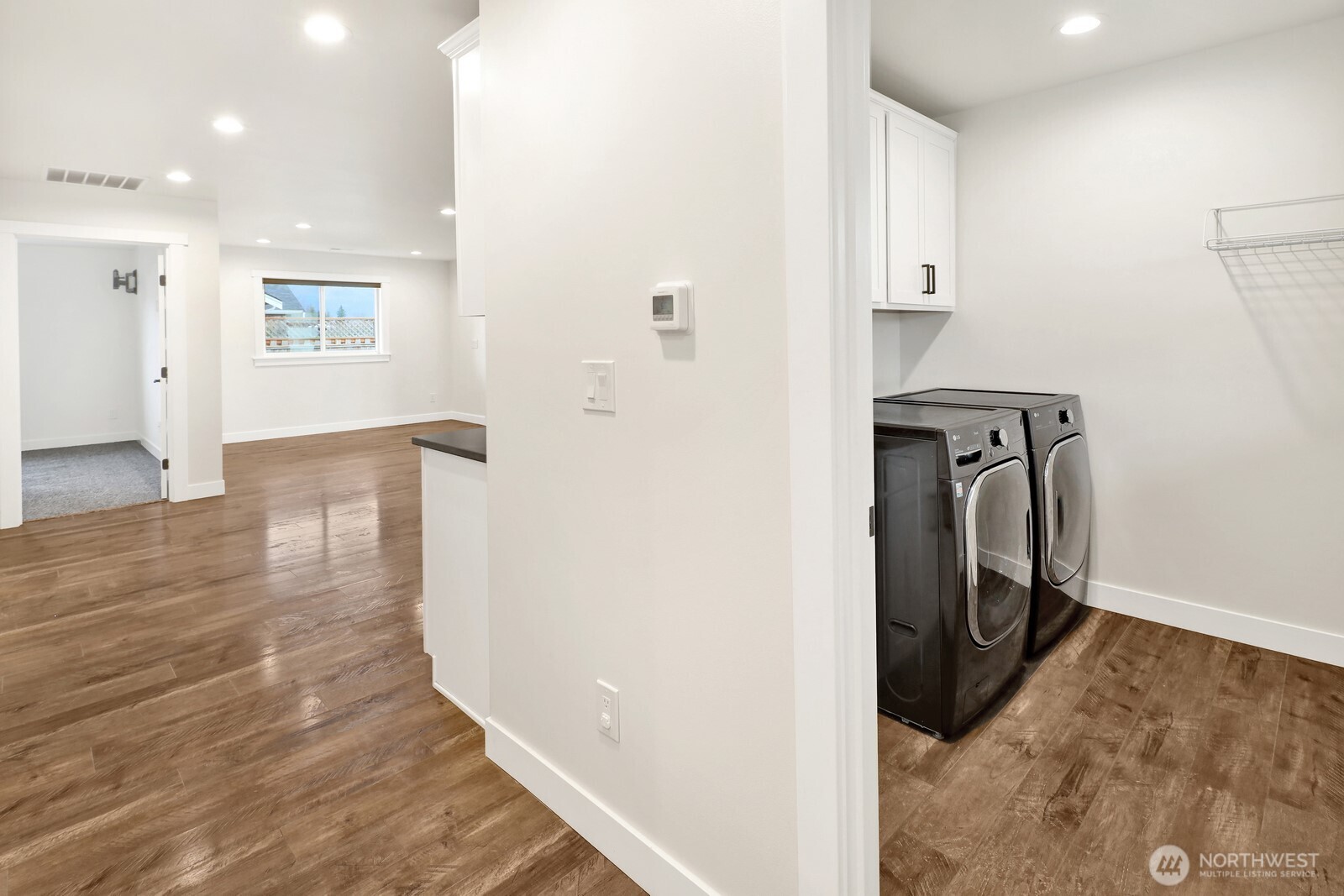 1302 Night Hawk Way Everson, WA 98247 - Photo 21 of 35 a view of a hallway with wooden floor